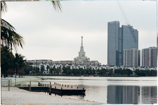 Captivating view of Hanoi's skyline featuring Vincom Landmark reflected in serene waters.