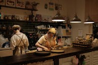 Cozy Vintage Cafe Interior with Baristas, Vietnam