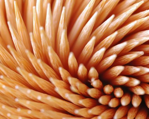 Free Macro shot of a spiral pattern in orange petals creating a mesmerizing, abstract formation. Stock Photo