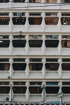 Patterned facade of a building in Mexico City with modern architecture design.