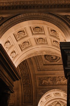 Intricate architectural ceiling detail in Cologne showcases classic ornate design.