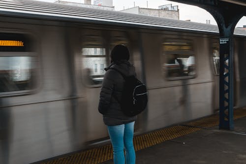 Free Photo of Woman Waiting at the Train Station Stock Photo