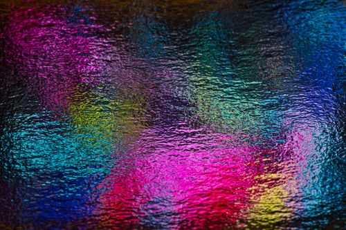 Free Bright and colorful abstract image with textured surface, perfect for creative designs. Stock Photo
