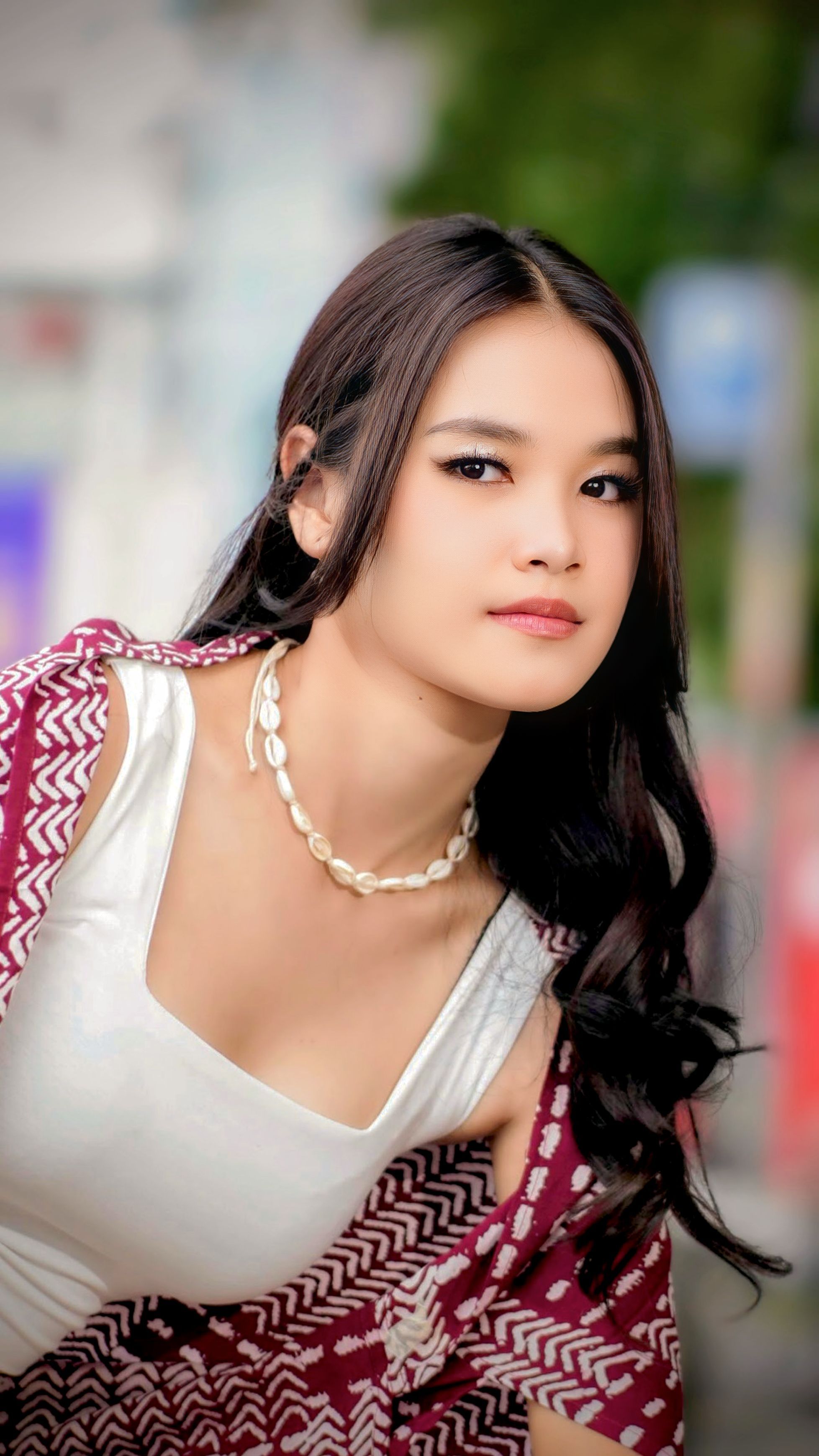A stylish woman with long hair in Bandung, West Java, Indonesia.