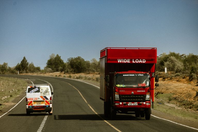 Gas Supply Management System — Truck and van travelling on a highway in Kenya for fleet and logistics operations