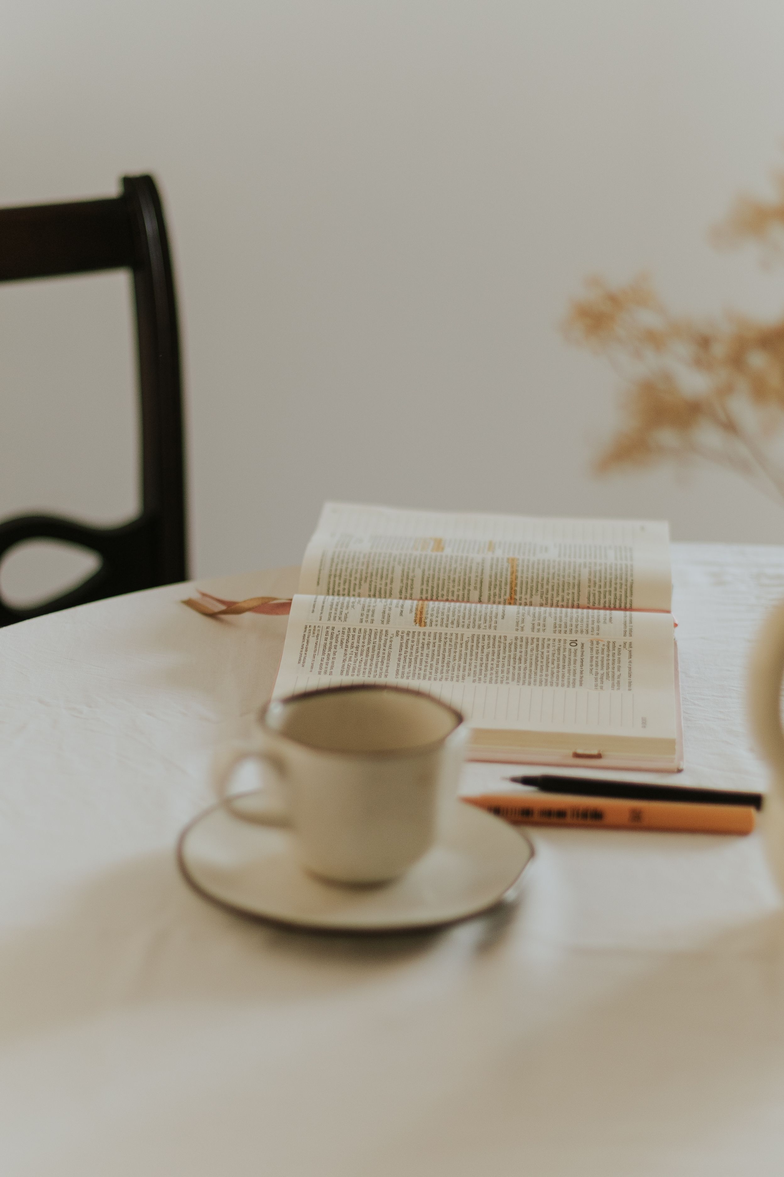 Cozy Reading Scene with Coffee Cup and Book · Free Stock Photo