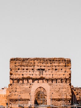 Stunning view of El Badi Palace ruins in Marrakesh, Morocco under a clear sky.