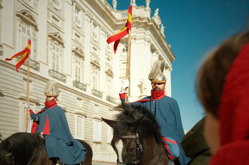 Spanish Royal Guard on horseback during a traditional ceremony at Royal Palace, Madrid.