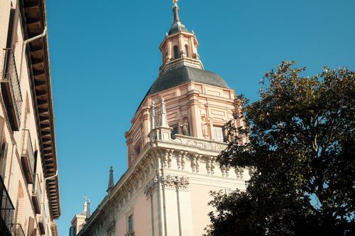 Free A beautiful historic Spanish building captured with clear blue skies, showcasing classic architecture. Stock Photo