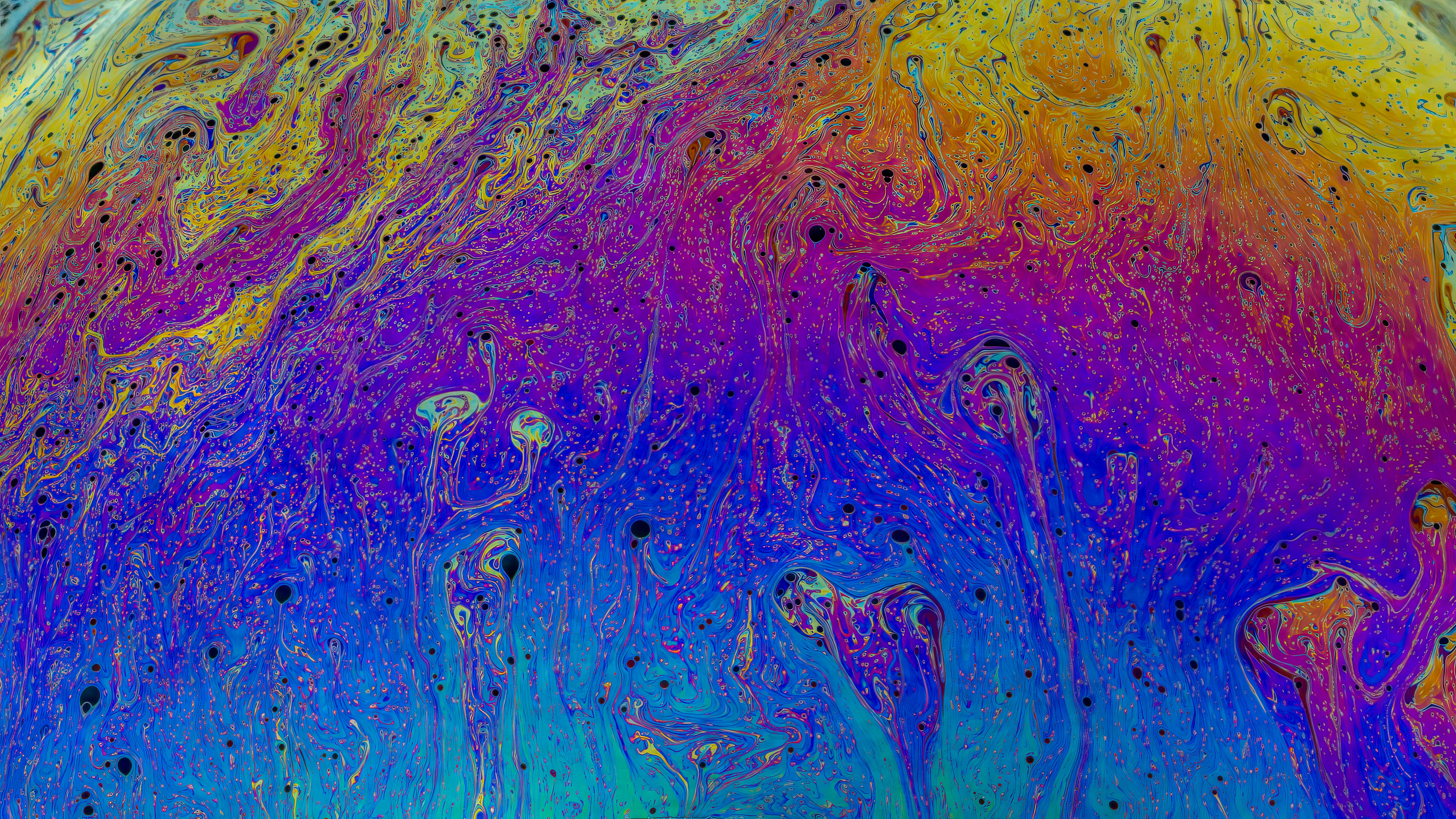 Free Explore a vibrant abstract art piece featuring swirling multicolored patterns resembling liquid textures. Stock Photo