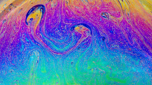 Dynamic abstract art with vibrant swirls and a psychedelic texture.