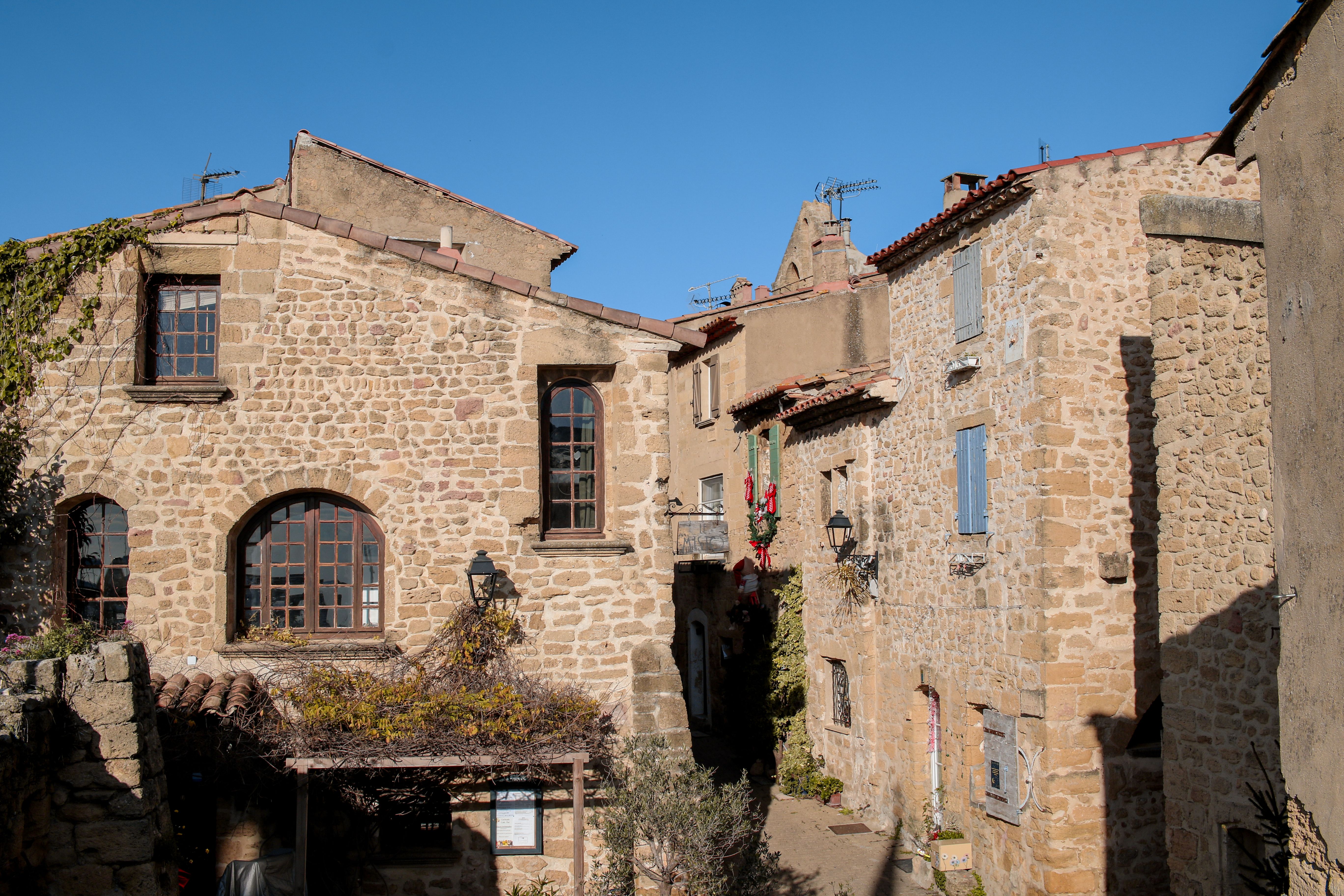 Picturesque small town in a French region, showcasing local architecture and charm.