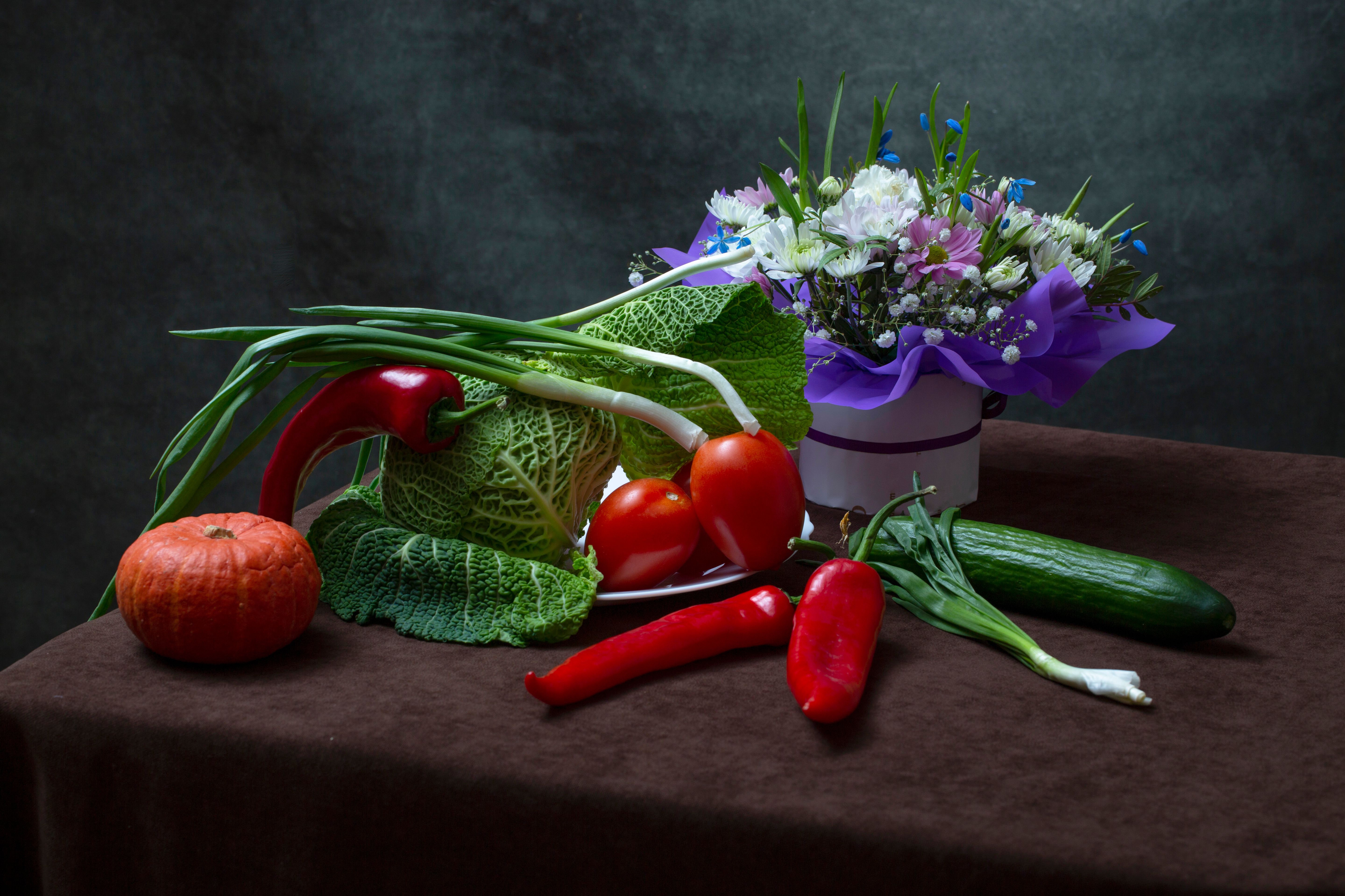 Vibrant Still Life with Vegetables and Flowers · Free Stock Photo