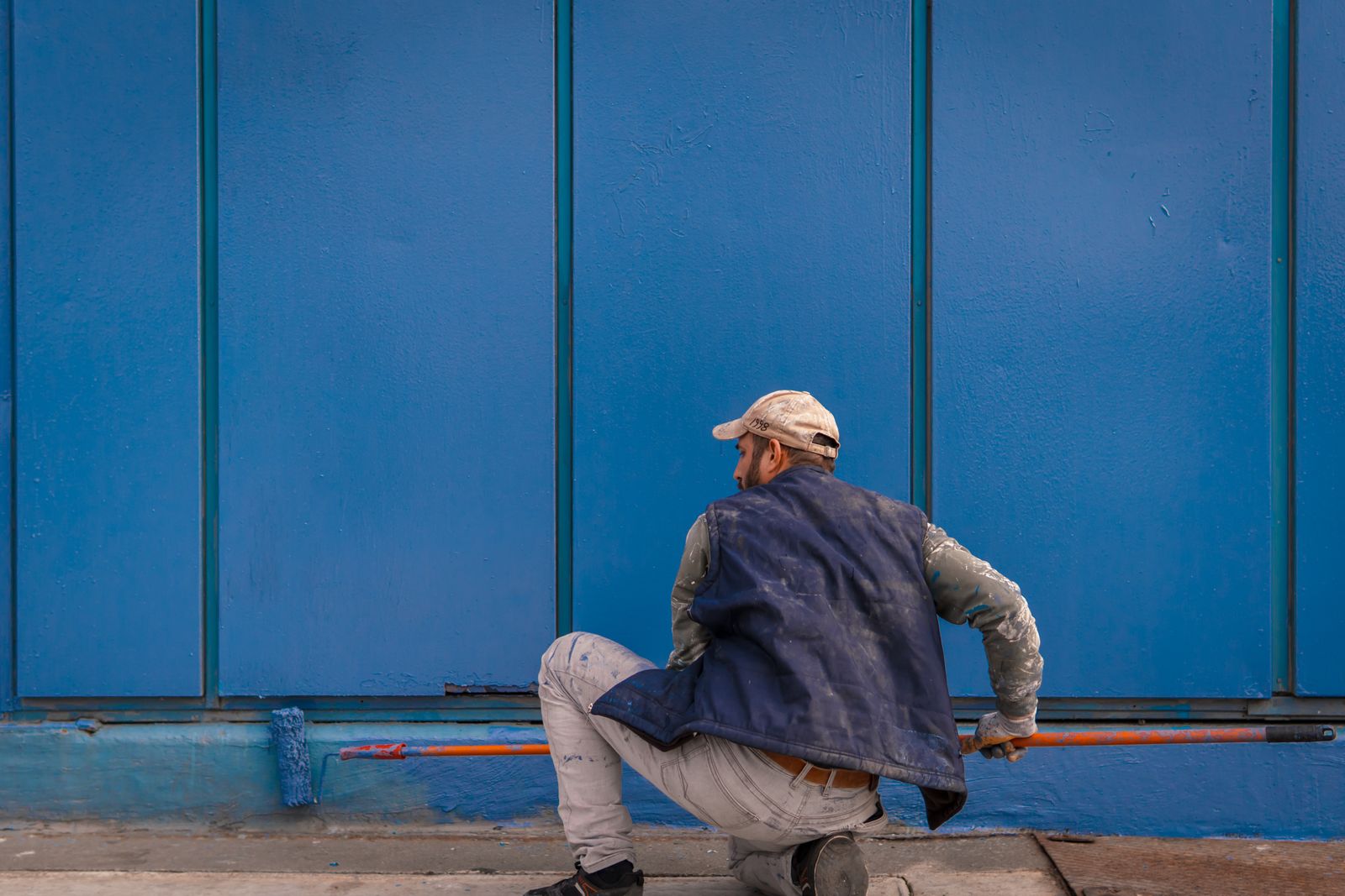 Interior wall being painted with a roller
