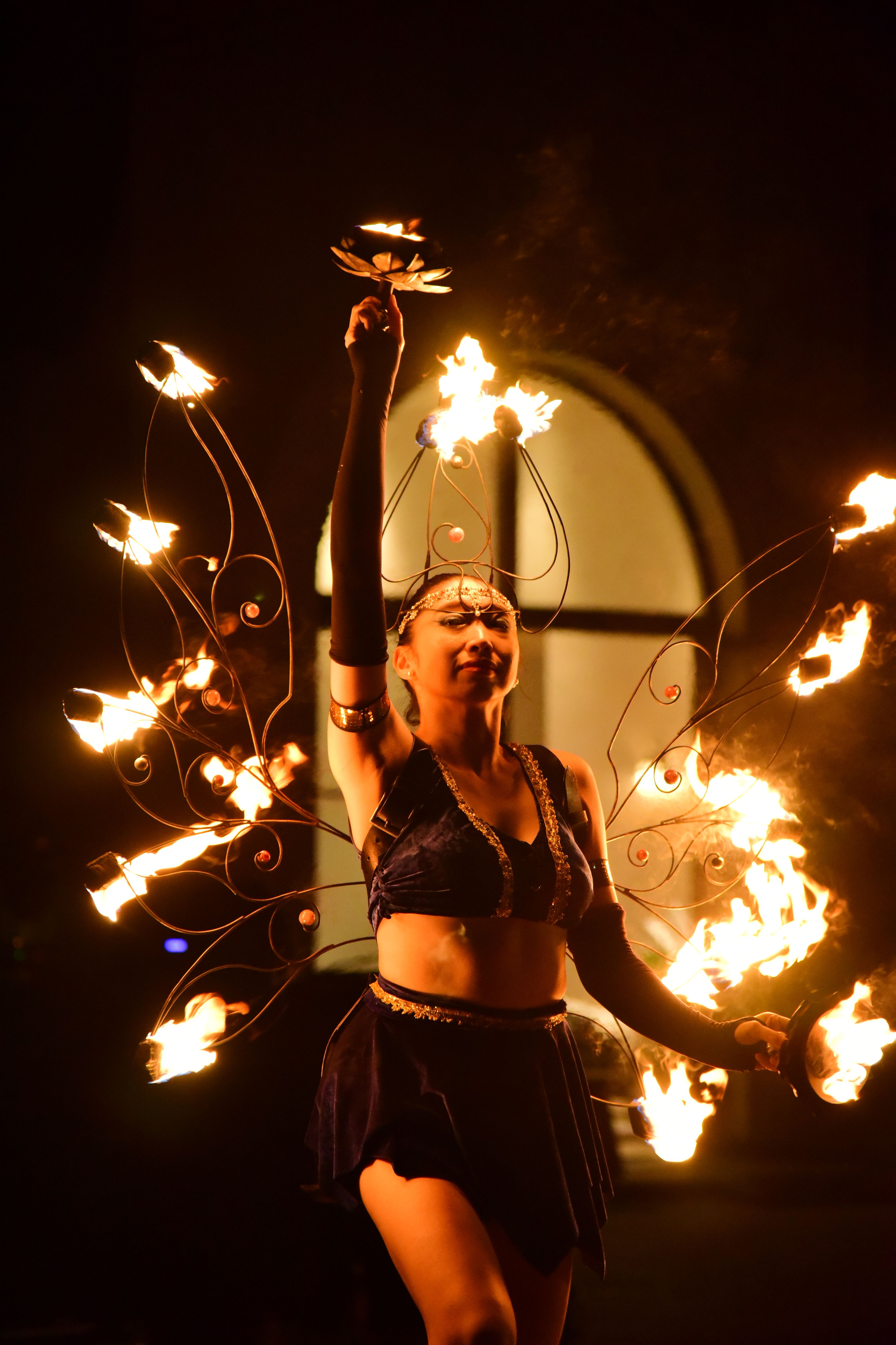Fire Performer Dancing with Fiery Wings at Night · Free Stock Photo