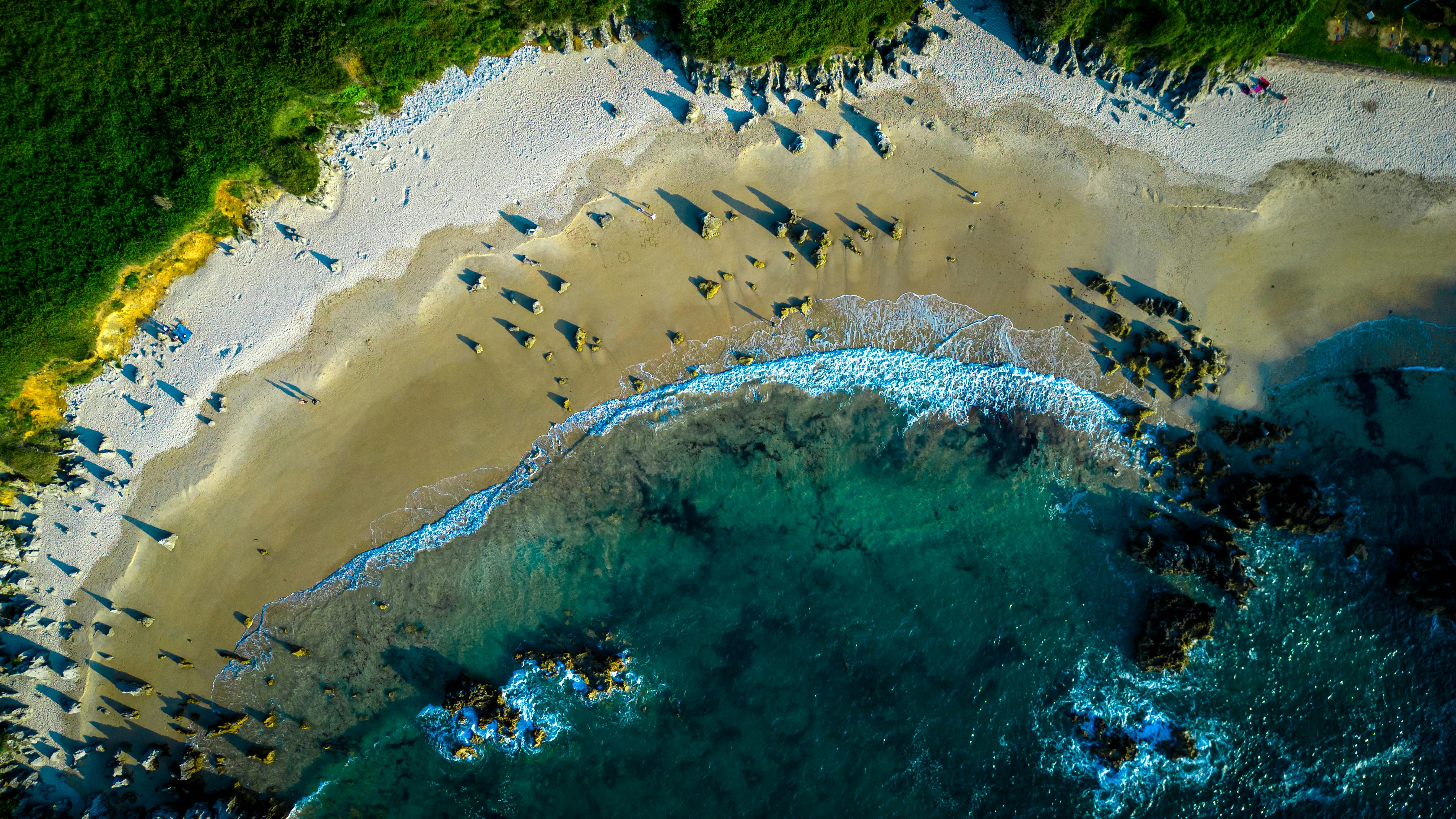 Aerial View of Scenic Llanes Beach in Spain