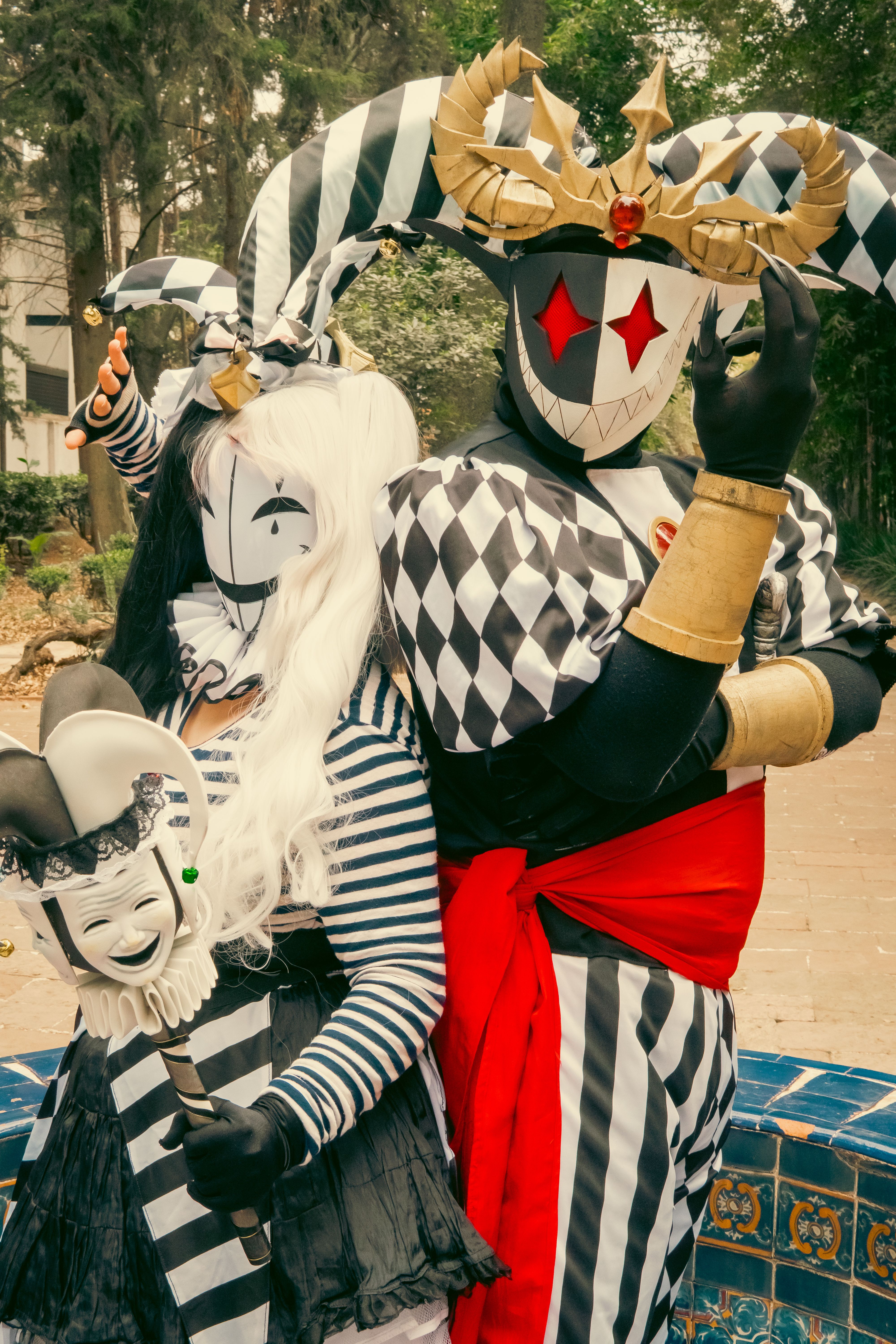 Extravagant Harlequin Costumes at Outdoor Carnival