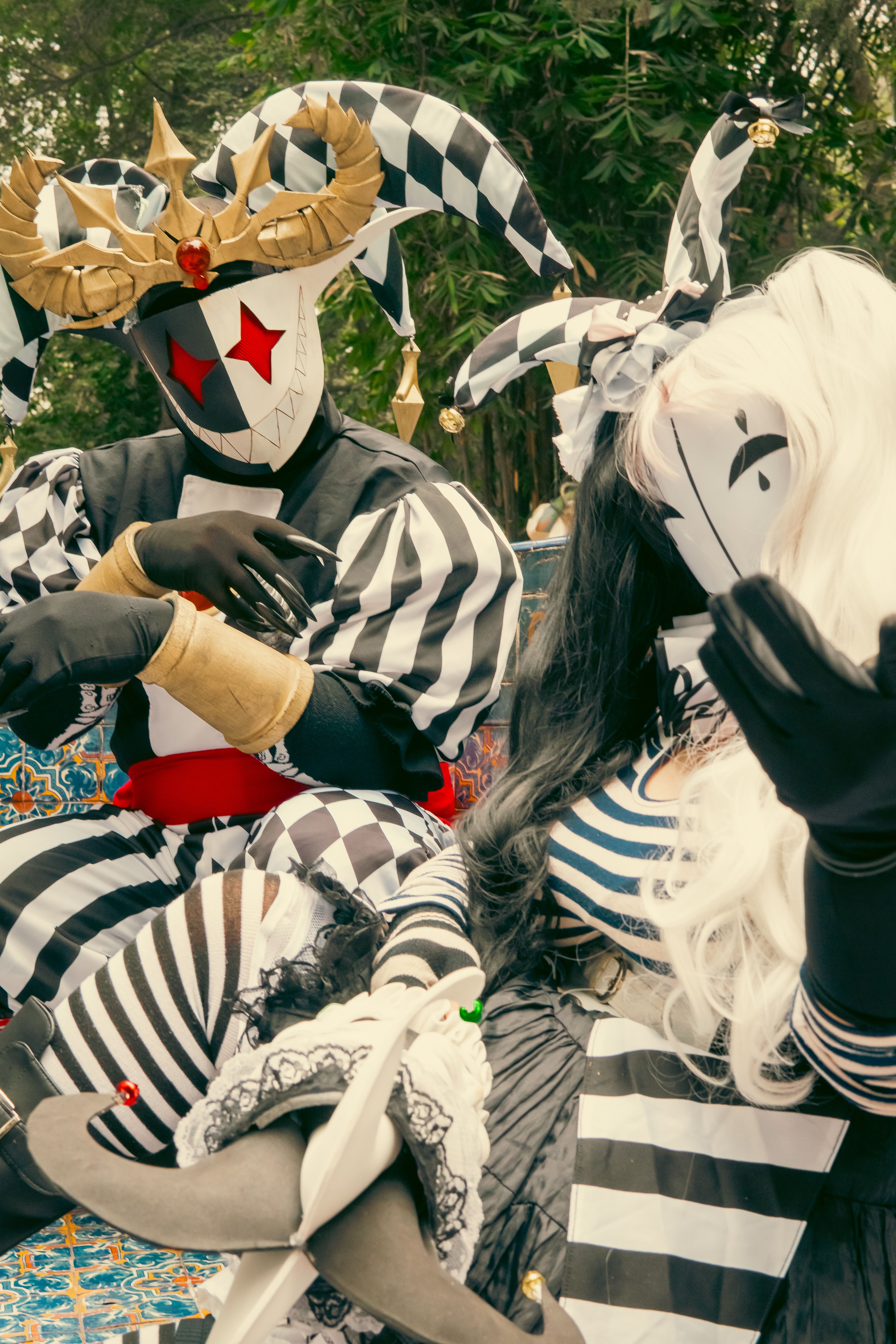 Colorful Harlequin Costumes at Outdoor Carnival