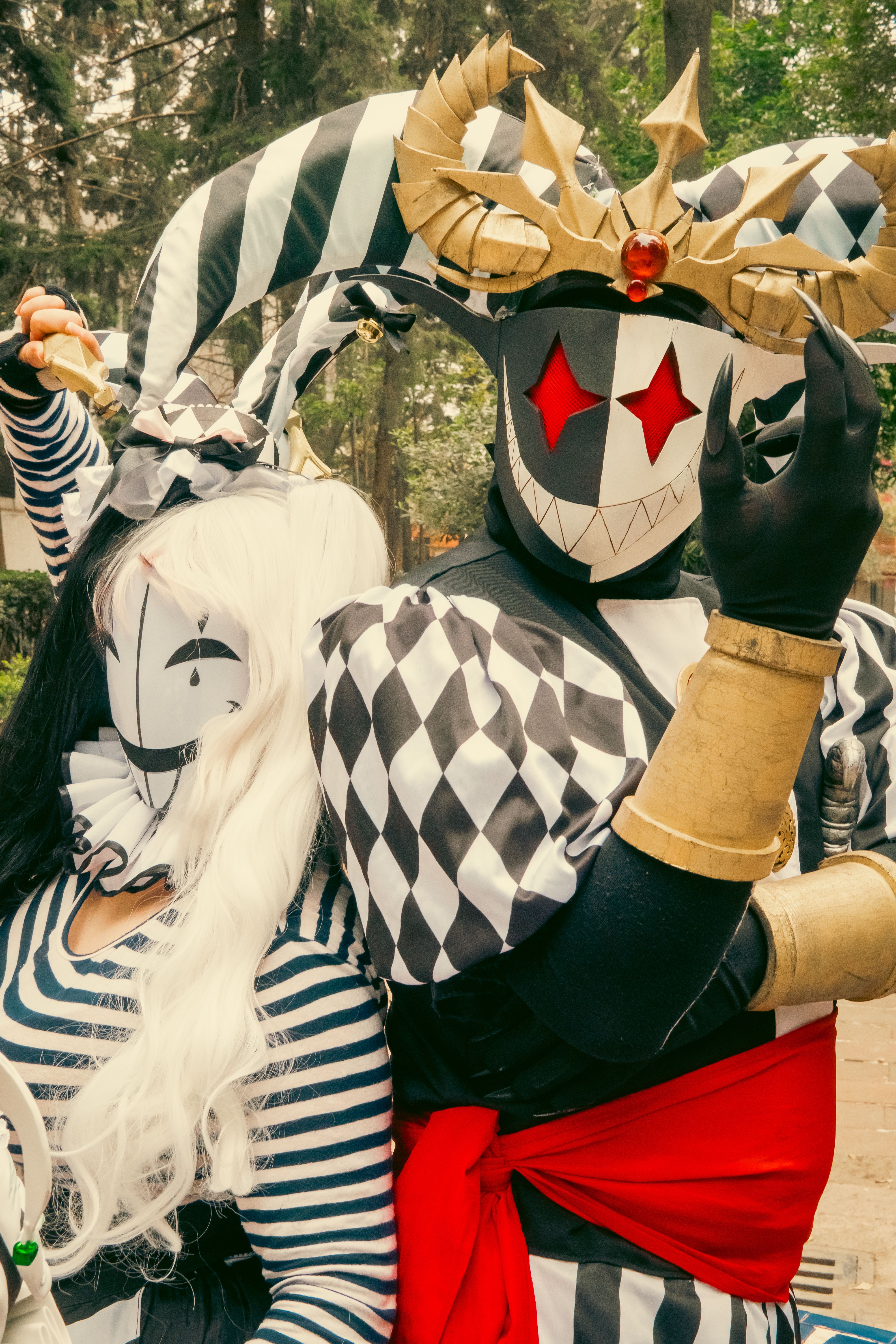Colorful Harlequin Costumes at Outdoor Carnival