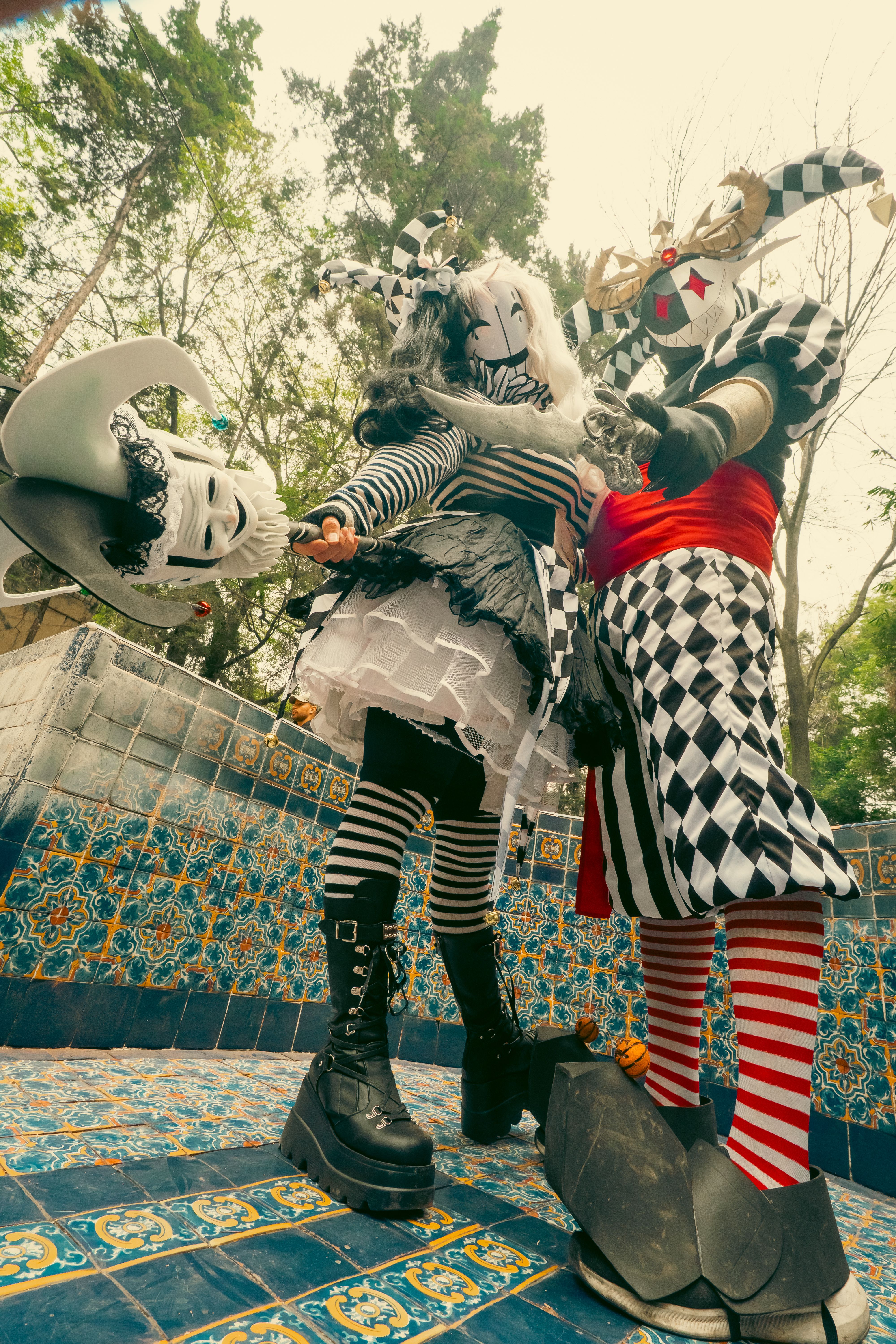 Carnival Themed Harlequin Couple in Vibrant Costumes