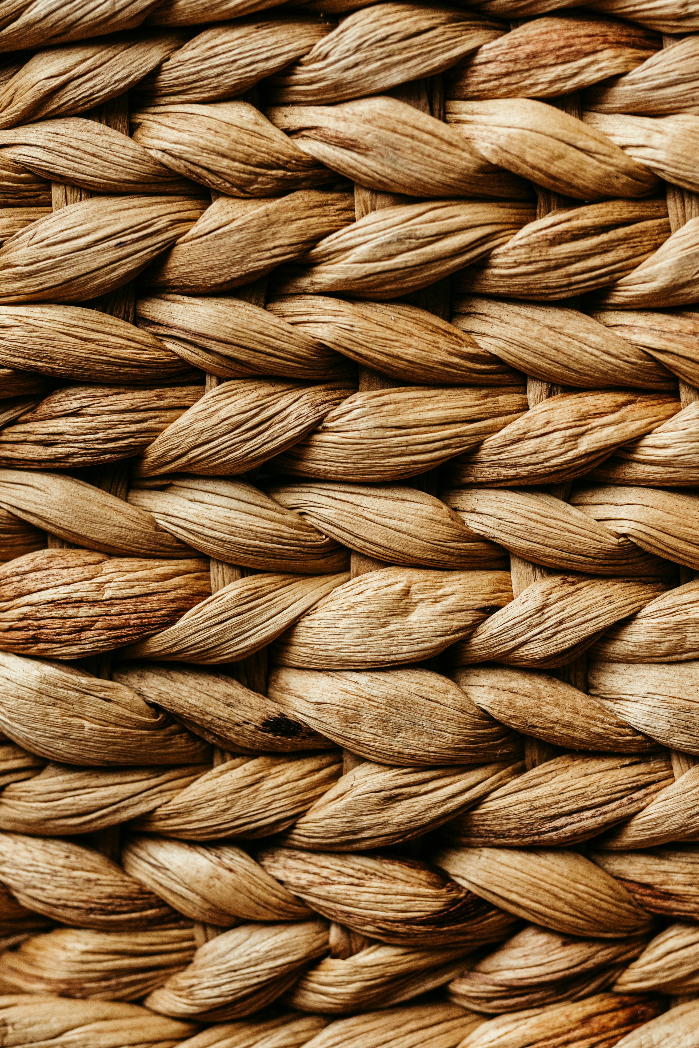 Free Detailed view of interwoven straw showcasing natural texture and pattern. Stock Photo