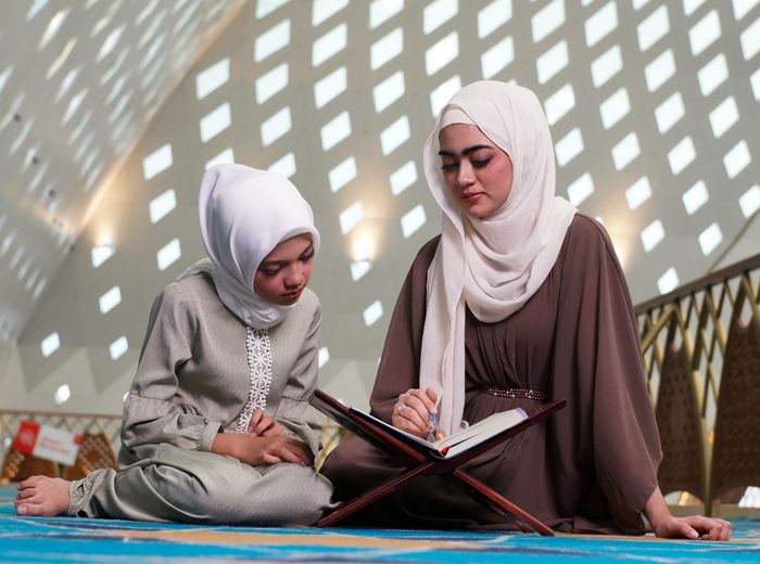 Mother and daughter reading