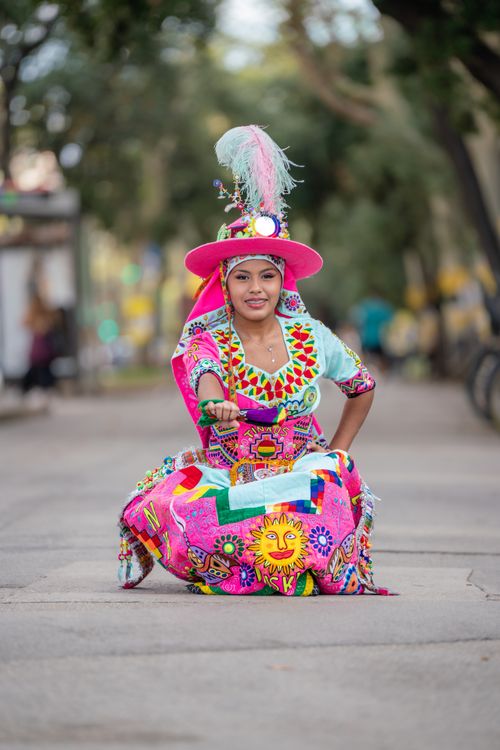 Free Vibrant portrait of a dancer in traditional costume on a street, capturing cultural heritage. Stock Photo