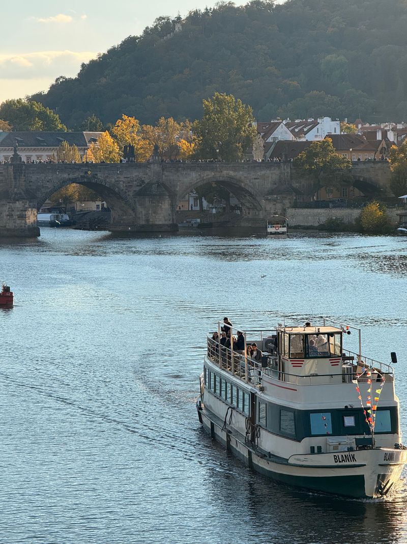 Prague sightseeing dinner cruise on open-top glass boat