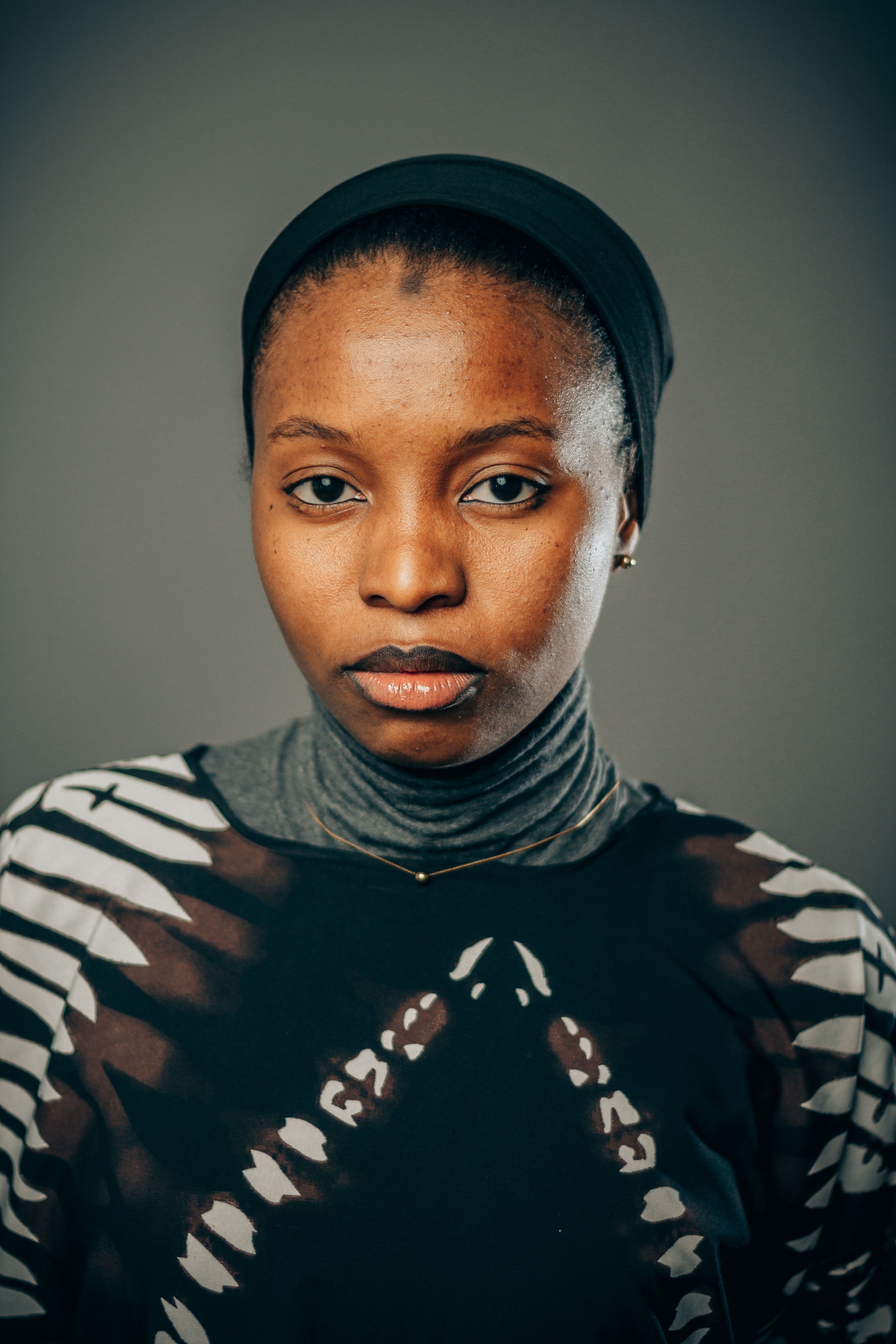 Portrait of a Young Woman with Headscarf · Free Stock Photo