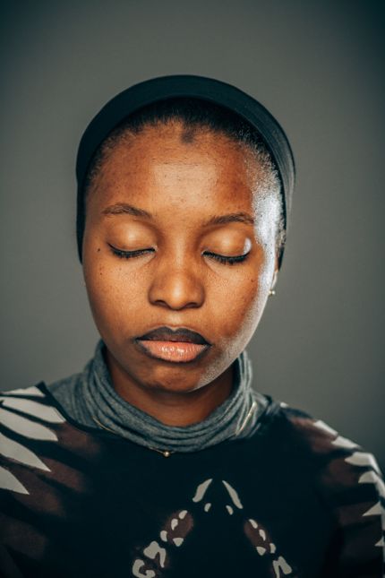 Portrait of a woman with a calm expression. Photo by Bakarii_photography on Pexels