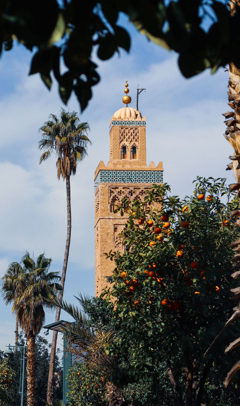 Koutoubia Mosque minaret viewed from lush gardens