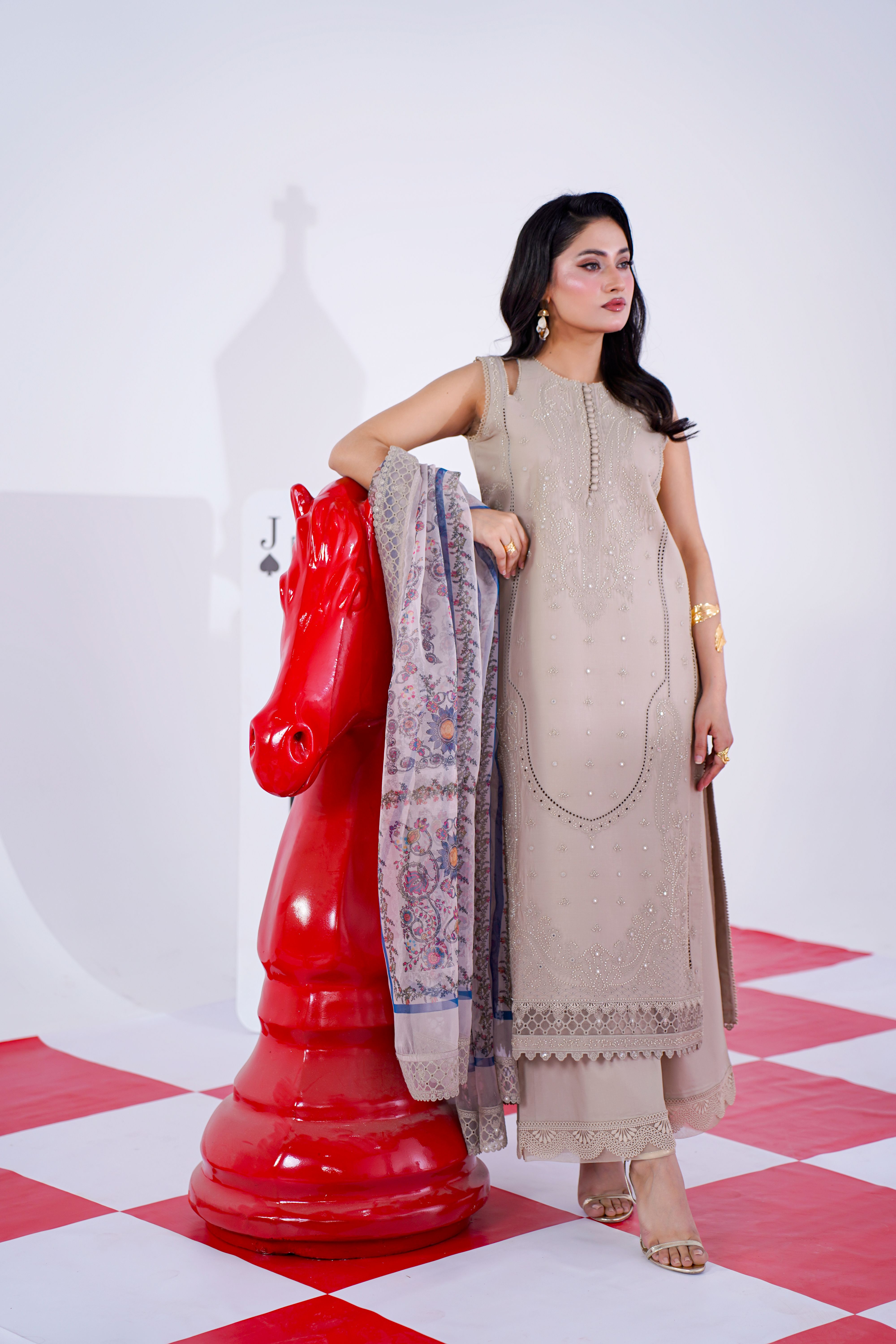 Embroidered Eastern Dress Next To Large