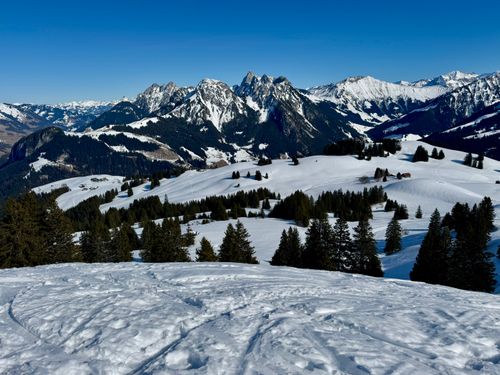 Free Breathtaking snowy landscape of the Swiss Alps with clear blue skies and picturesque mountains. Stock Photo