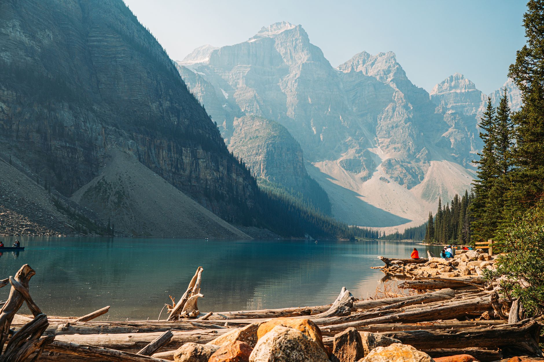 Picturesque view of Moraine Lake with stunning mountain backdrop in Banff National Park, Alberta, Canada.