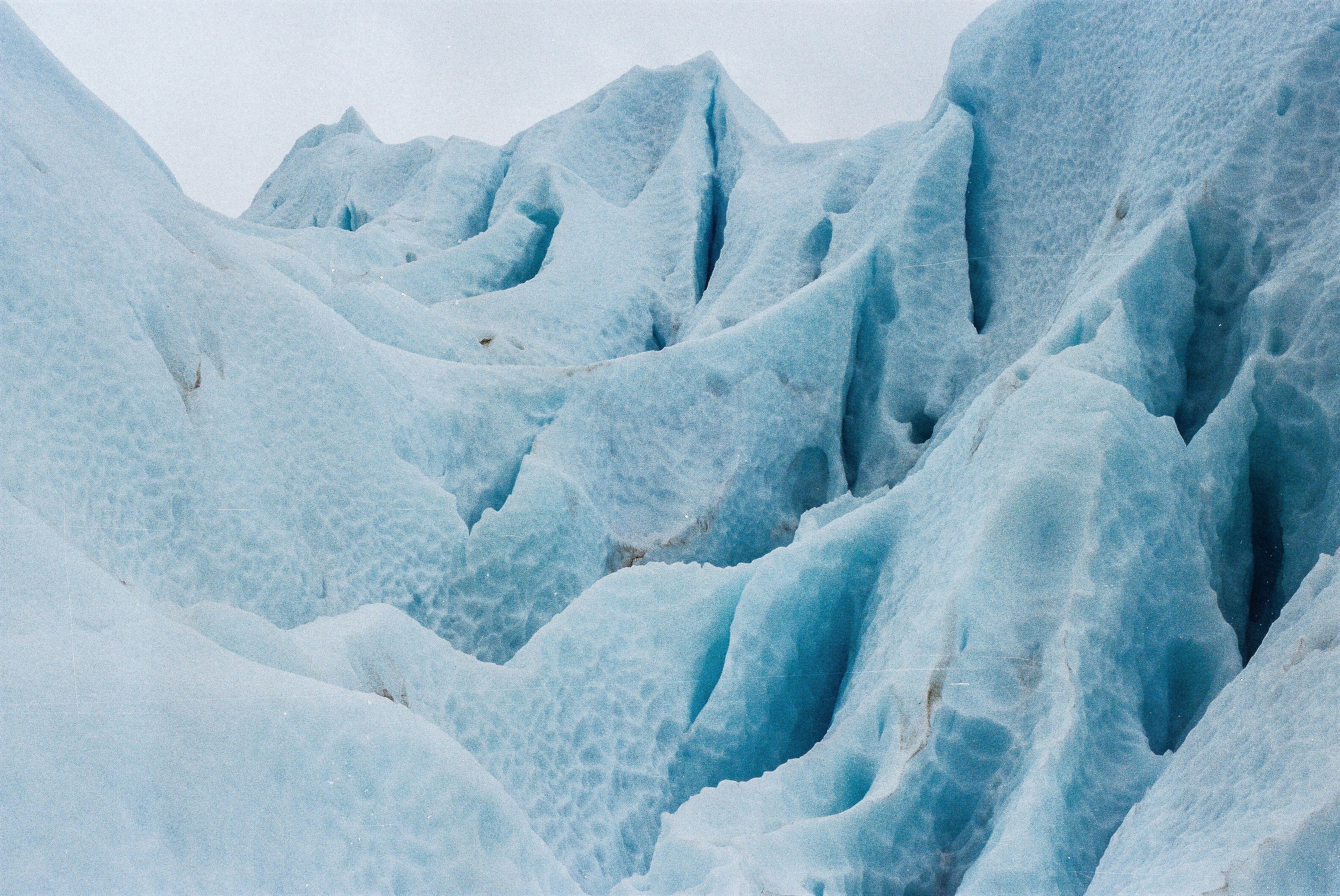 Knik Glacier Helicopter Flight-90 Mins-1 Landing-Anchorage Area - Explore the stunning ice formations of a natural glacier, showcasing intricate textures and shades of blue.