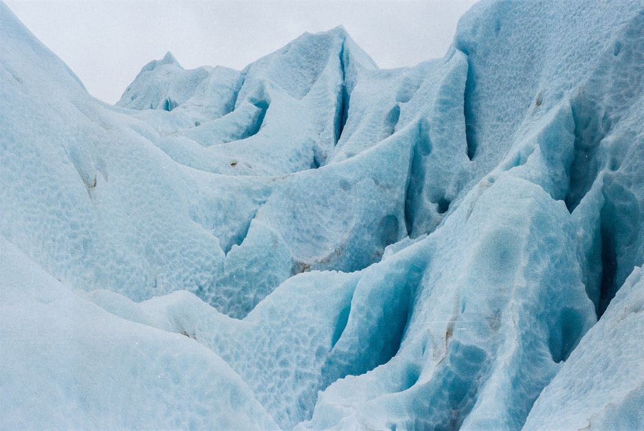 Knik Glacier Helicopter Flight-90 Mins-1 Landing-Anchorage Area - Explore the stunning ice formations of a natural glacier, showcasing intricate textures and shades of blue.