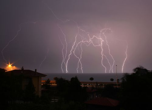 Free Striking lightning bolts illuminate the night sky over Fındıklı, Rize, Türkiye. Stock Photo