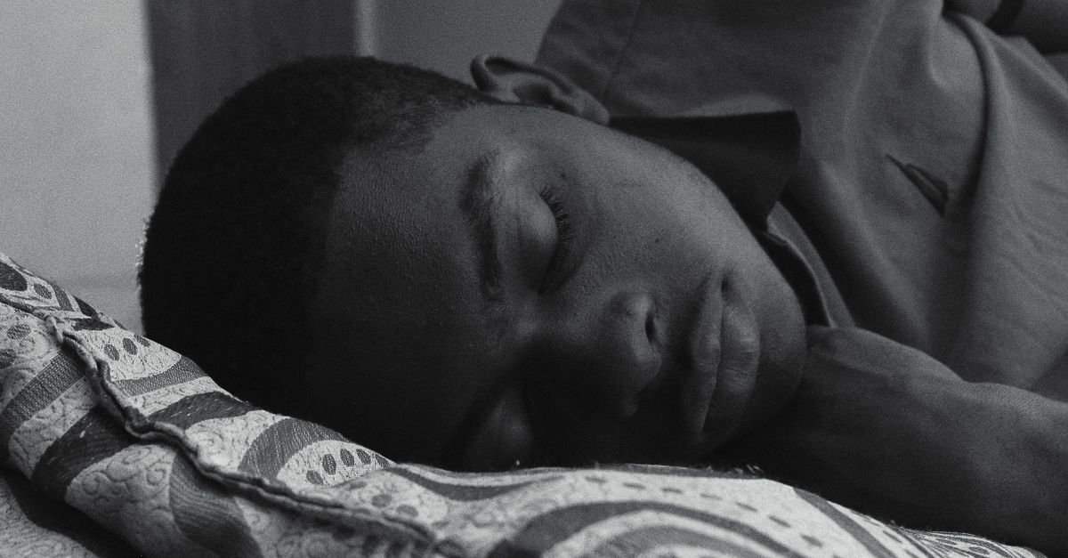 person sleeping peacefully with a calm expression