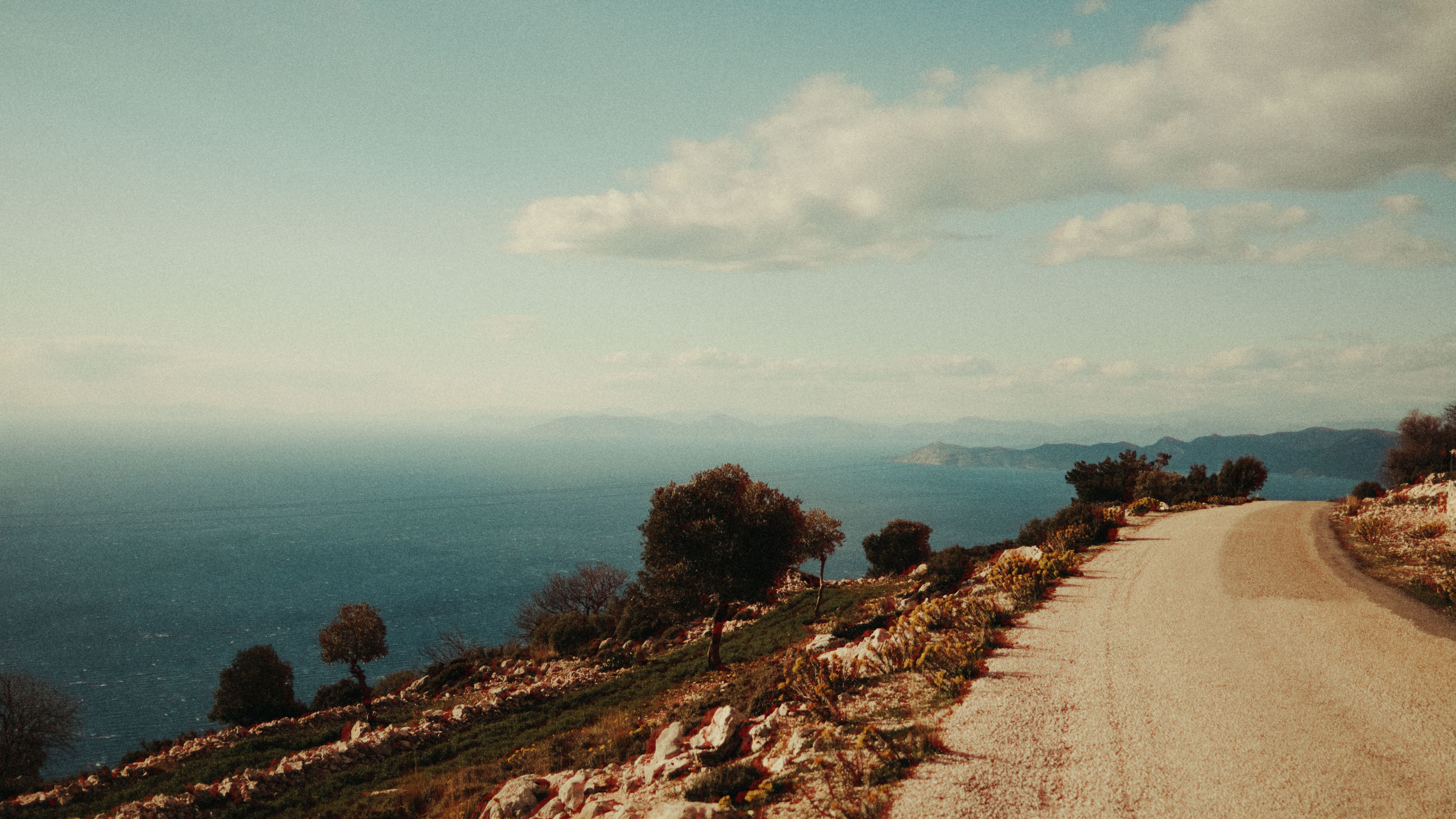 Scenic Coastal Road with Ocean View · Free Stock Photo