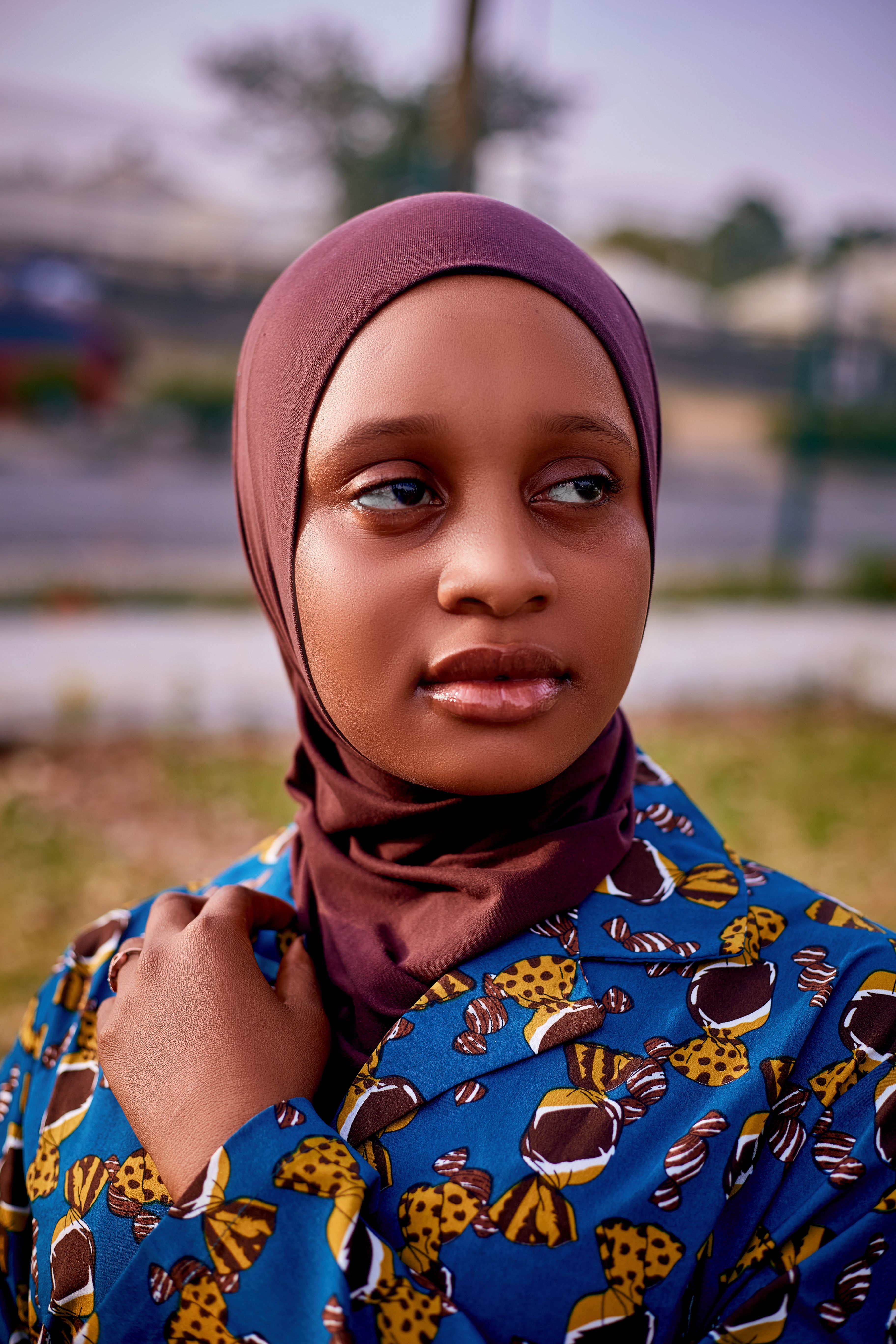 Portrait of a Young Woman in Vibrant African Attire · Free Stock Photo