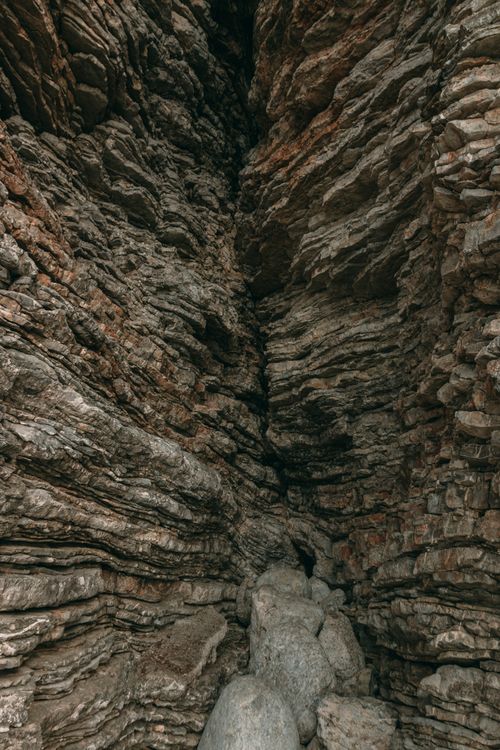 Free Explore the textured beauty of a striated rock formation in Budva, Montenegro. Perfect for nature and geology enthusiasts. Stock Photo