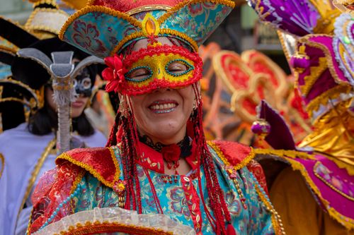 Free Colorful carnival costumes and masks in the lively streets of Tarma, Peru. Stock Photo