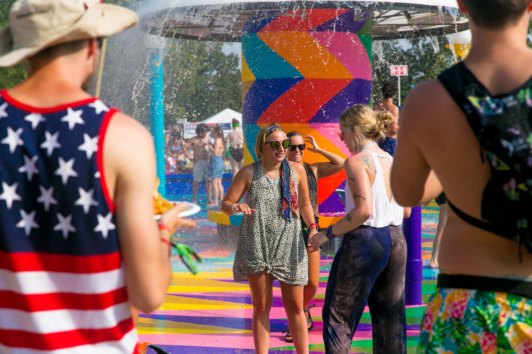 People enjoying an outdoor summer festival