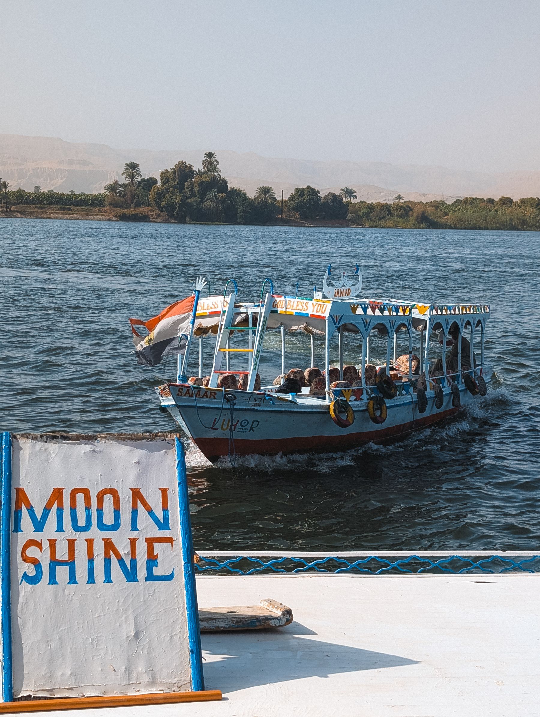 Tour boat sailing on the Nile River in Luxor Egypt
