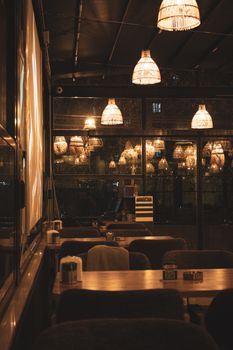 Warm and inviting Turkish cafe interior with dim lighting, perfect for a relaxing evening.