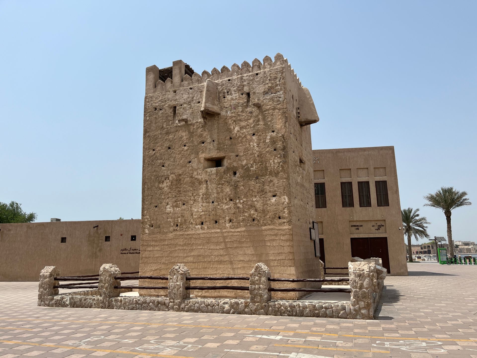 Explore the ancient architectural charm of a historic tower in Dubai's cultural district.