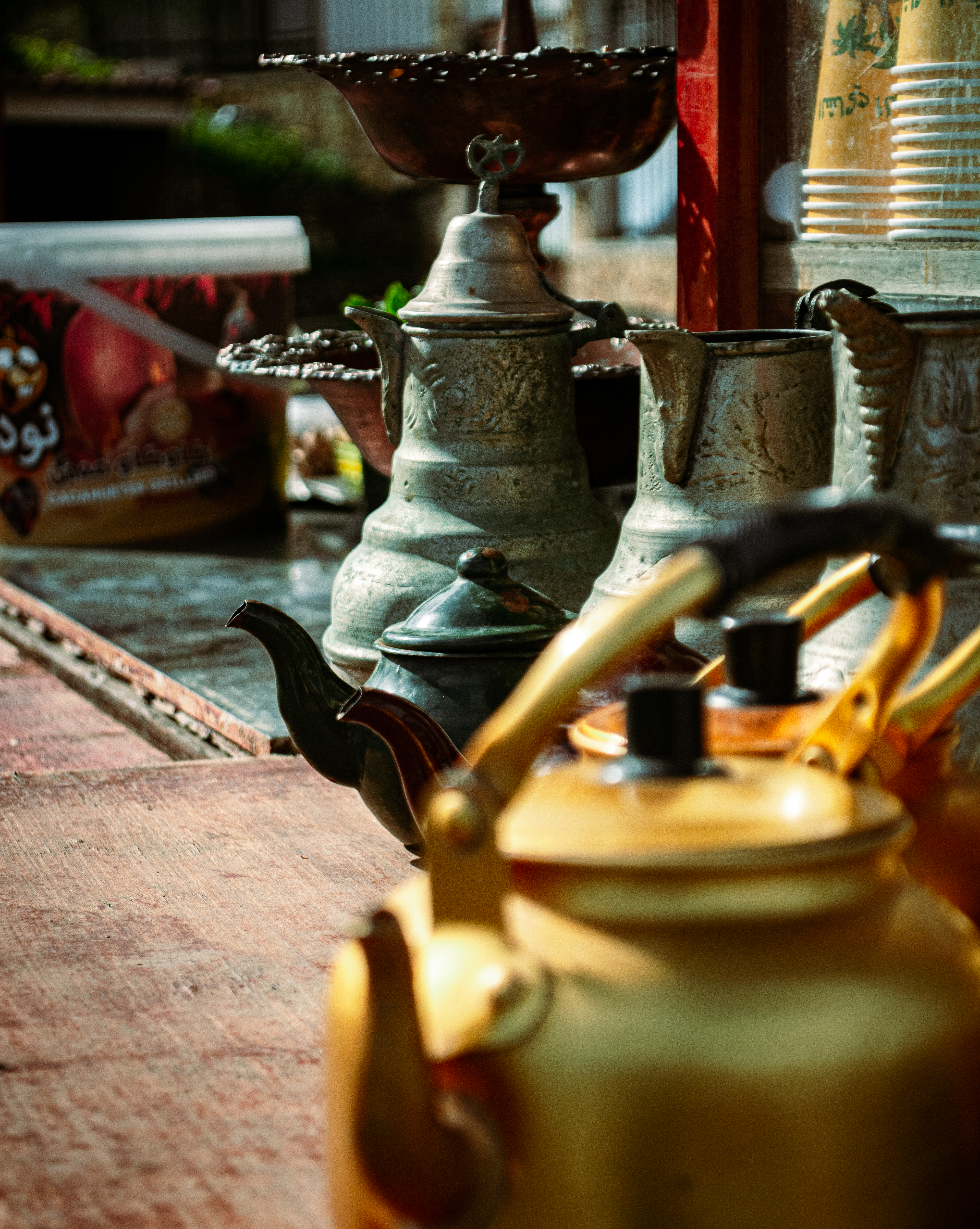 Traditional Middle Eastern Tea Setup with Copper Teapots · Free Stock Photo