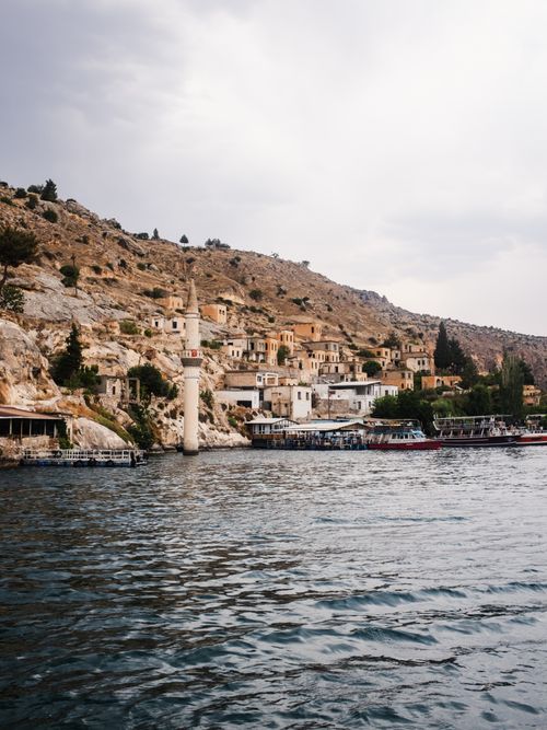 Free Picturesque landscape of Halfeti, Turkey, featuring historic architecture by the Euphrates River. Stock Photo