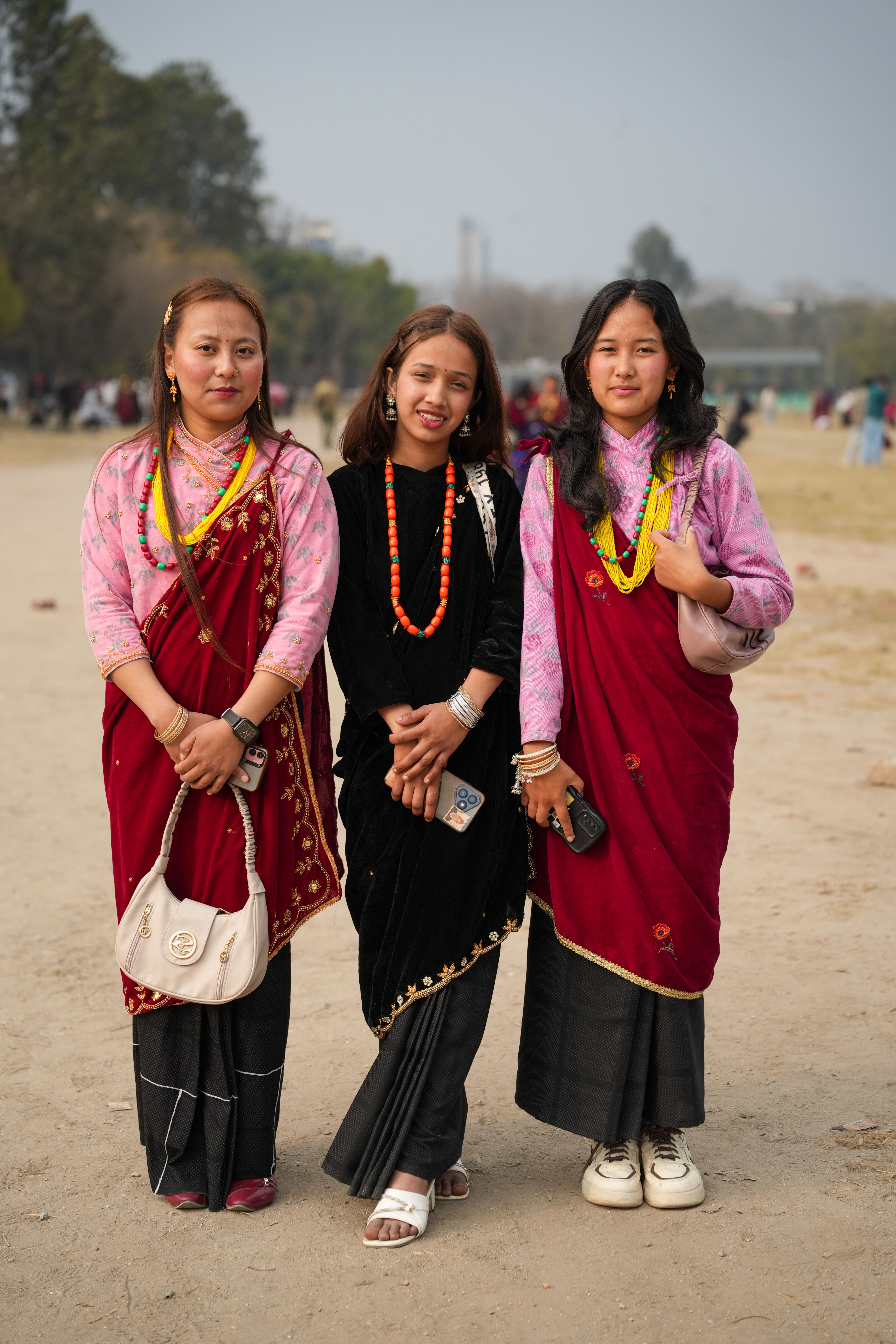 Smiling Women in Traditional Clothing Standing at Festival · Free Stock ...