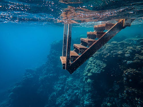 Free View Of Wooden Steps Taken Underwater Stock Photo